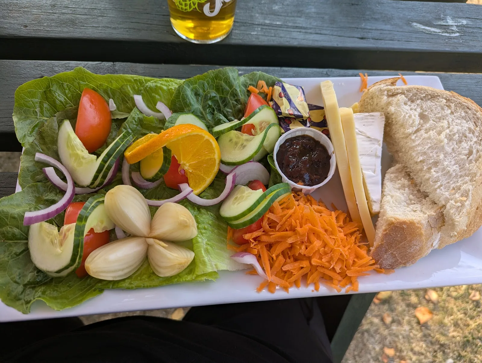 A ploughman's at the Yew Tree Inn: cheddar, brie, pickled onions, chutney, crusty bread and salad, eaten at a bench in the garden